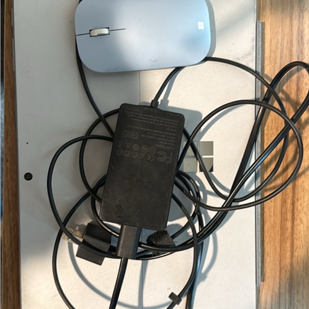 Sleek Silver Laptop with Accessories
